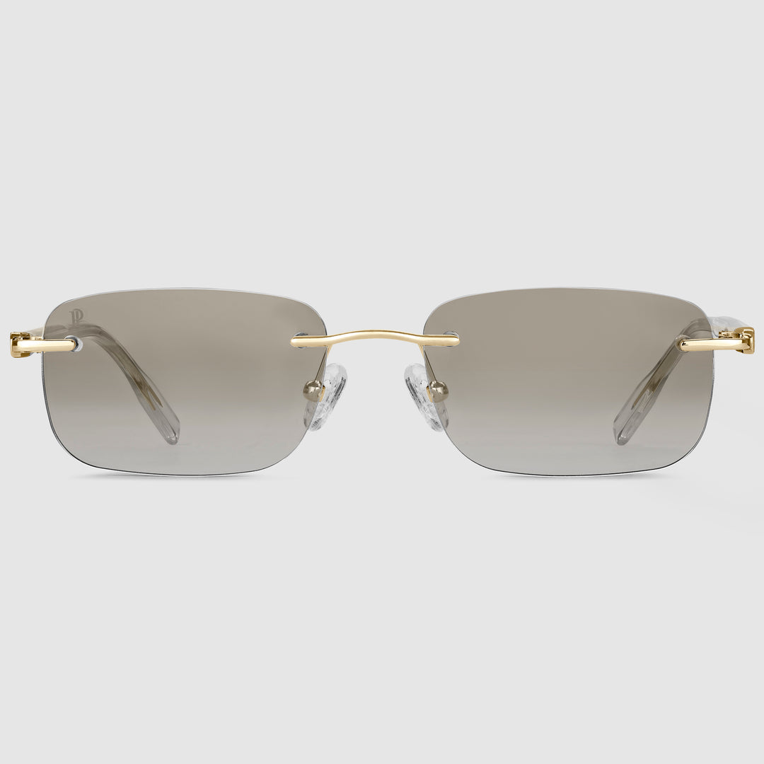 Asteria Midnight Unisexbrille in Gold – Randloses Design mit photochromen Gläsern in der Frontansicht.