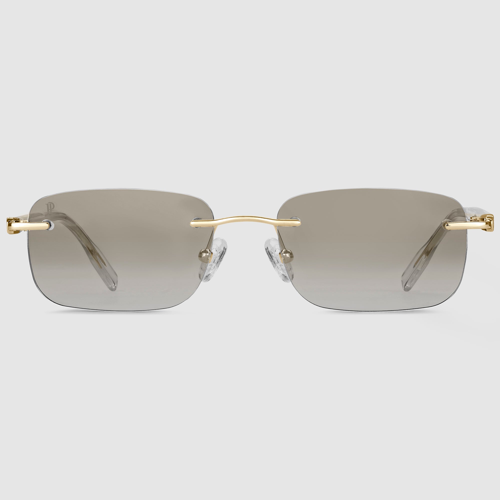 Asteria Midnight Unisexbrille in Gold – Randloses Design mit photochromen Gläsern in der Frontansicht.