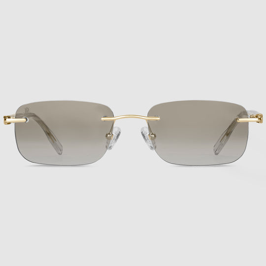 Asteria Midnight Unisexbrille in Gold – Randloses Design mit photochromen Gläsern in der Frontansicht.