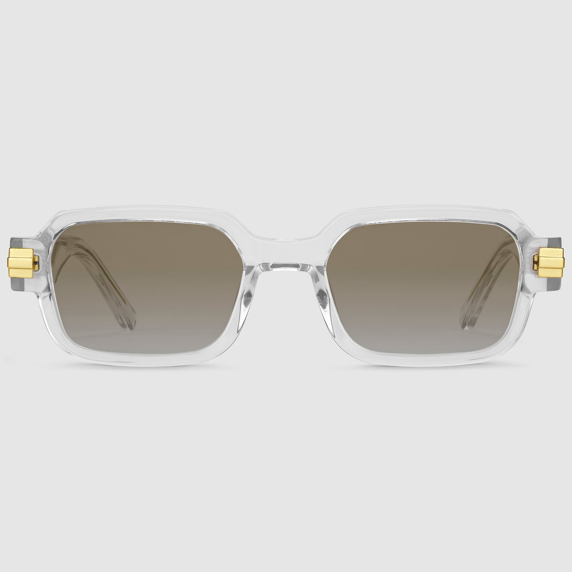 Luxora Midnight Unisex-Brille von Priolet – rechteckiger Rahmen in transparentem Design mit goldfarbenen Metallelementen und braunen, photochromen Verlaufsgläsern.